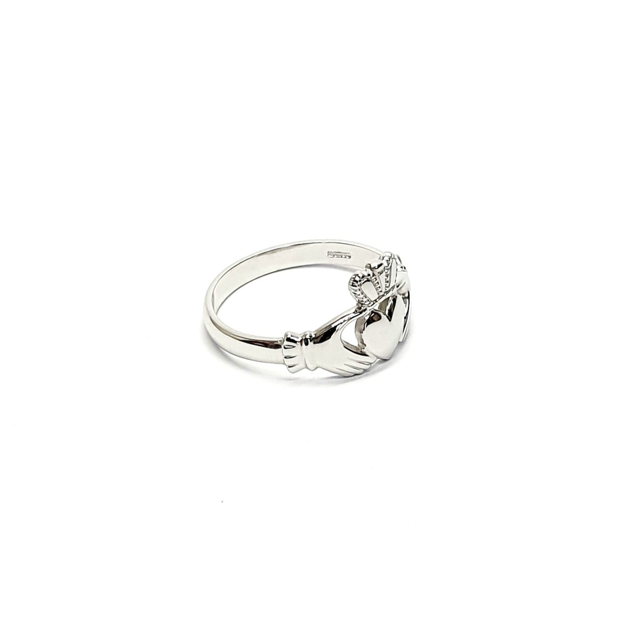 A 9ct white gold Claddagh ring (Irish fáinne Chladaigh) is a traditional Irish ring in which a heart represents love, the crown stands for loyalty, and two clasped hands symbolize friendship.