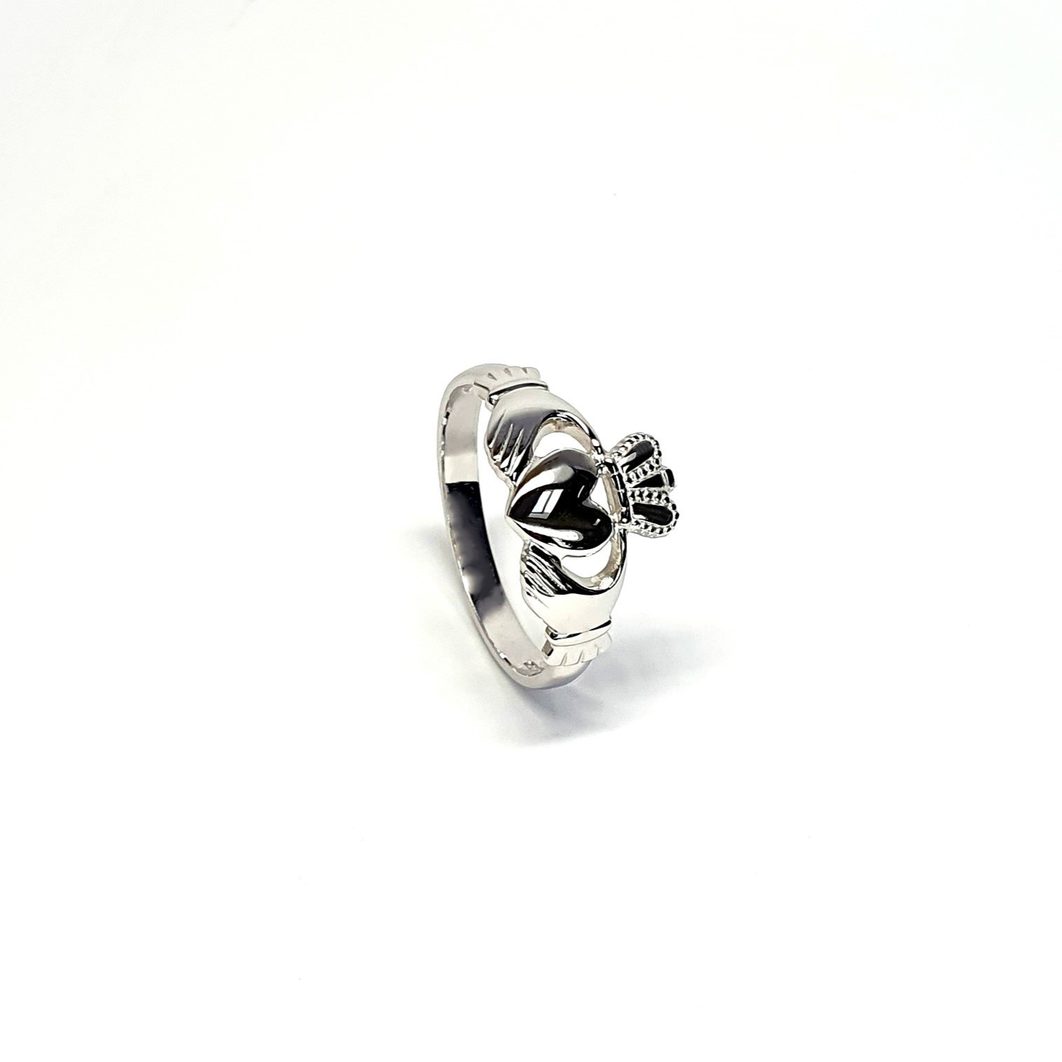 A 9ct white gold Claddagh ring (Irish fáinne Chladaigh) is a traditional Irish ring in which a heart represents love, the crown stands for loyalty, and two clasped hands symbolize friendship.