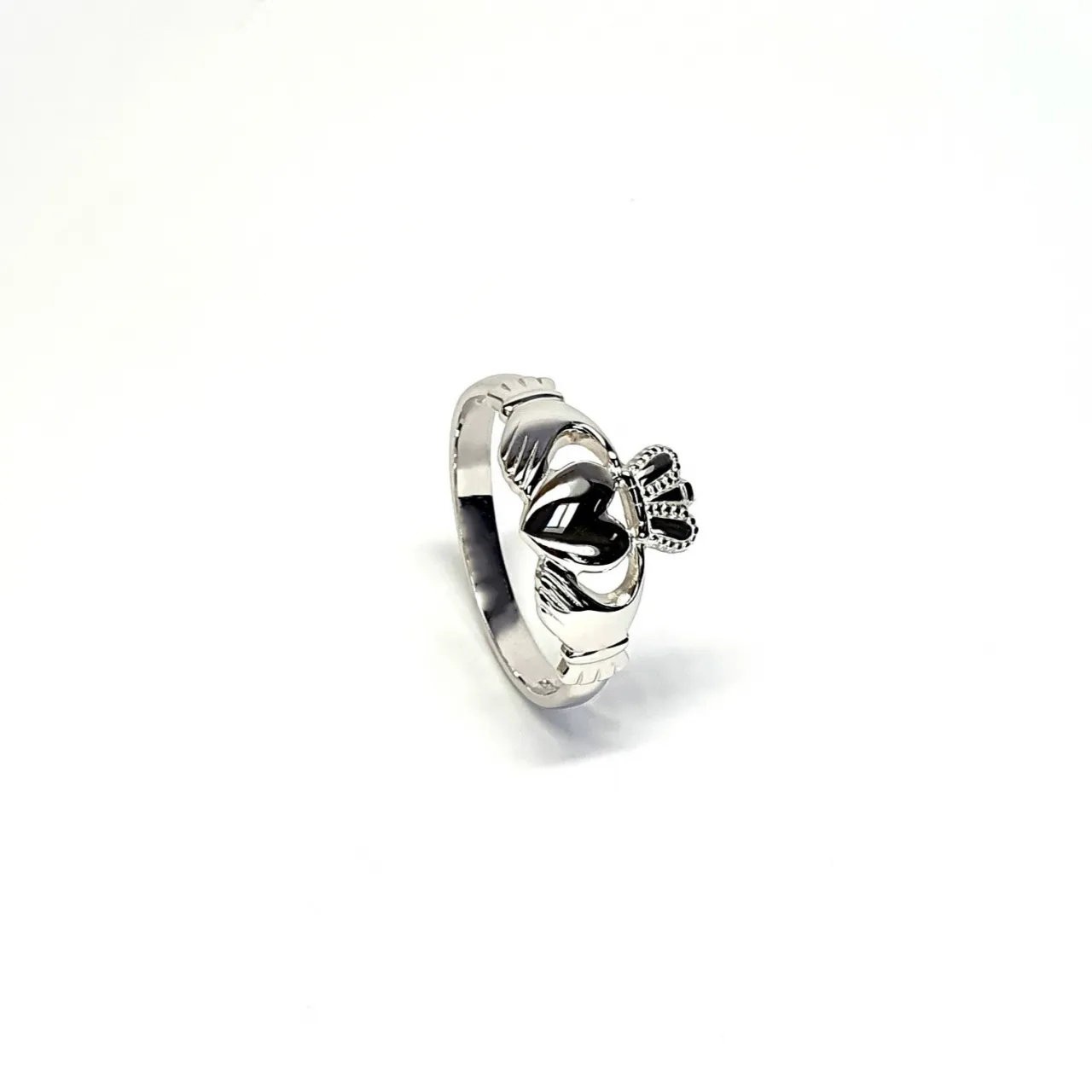 A 9ct white gold Claddagh ring (Irish fáinne Chladaigh) is a traditional Irish ring in which a heart represents love, the crown stands for loyalty, and two clasped hands symbolize friendship.