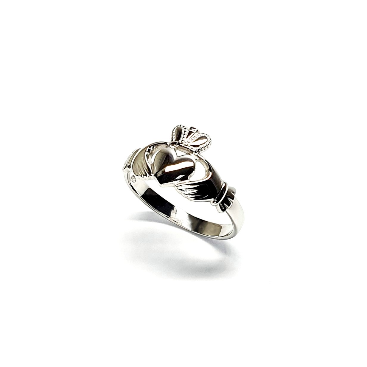 A 9ct white gold Claddagh ring (Irish fáinne Chladaigh) is a traditional Irish ring in which a heart represents love, the crown stands for loyalty, and two clasped hands symbolize friendship.