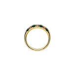 18ct yellow gold seven-stone eternity ring 3.5mm wide set with four 2.8mm round emeralds and three 2.8mm round diamonds in four claw settings