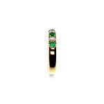 18ct yellow gold seven-stone eternity ring 3.5mm wide set with four 2.8mm round emeralds and three 2.8mm round diamonds in four claw settings