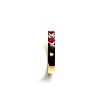 18ct yellow gold ruby and diamond half eternity ring set with three round white diamonds and four round blood red rubies, a solid tactile ring with rounded edges