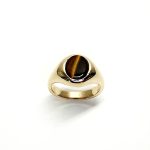 The City of London Jewellers presents the Eyemouth heavy 9ct yellow gold 12mm x 10mm oval Tigers Eye with a slightly curved top rub-over set into a plain polished signet ring, top view
