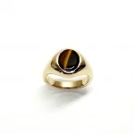The City of London Jewellers presents the Eyemouth heavy 9ct yellow gold 12mm x 10mm oval Tigers Eye with a slightly curved top rub-over set into a plain polished signet ring, top view