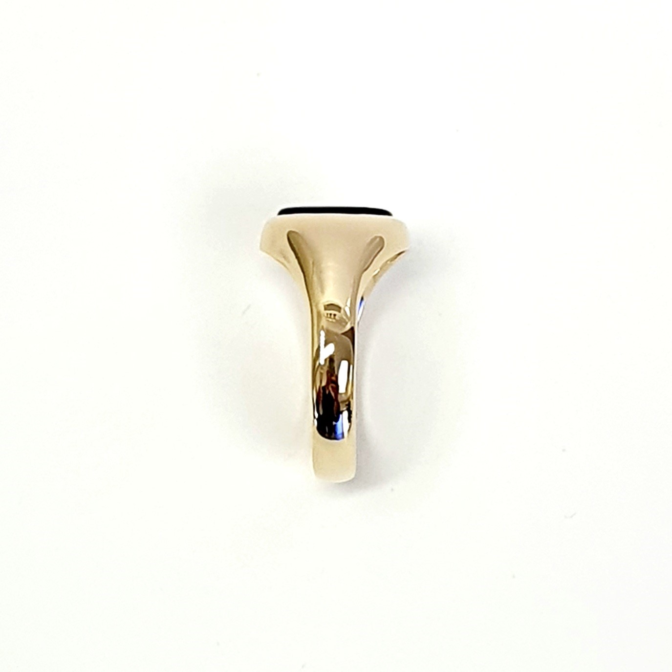 The City of London Jewellers presents the Eyemouth heavy 9ct yellow gold 12mm x 10mm oval Tigers Eye with a slightly curved top rub-over set into a plain polished signet ring, shoulder view facing right.
