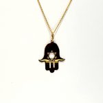 This Hamsa Pendant/necklace incorporates a cut-out design of a Star of David of filigree style with a diamond cut pattern for extra sparkle. Back view.