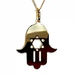 This Hamsa Pendant/necklace incorporates a cut-out design of a Star of David of filigree style with a diamond cut pattern for extra sparkle. Back view