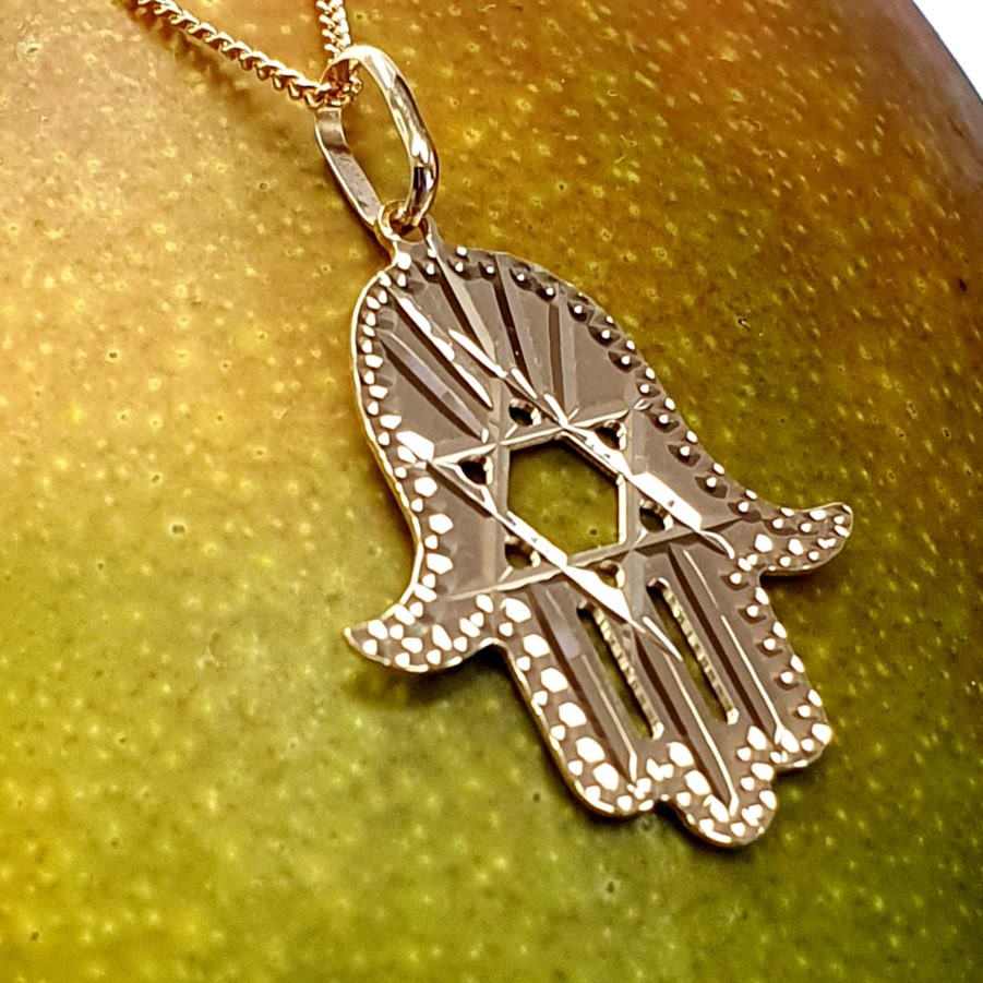 This Hamsa Pendant/necklace incorporates a cut-out design of a Star of David of filigree style with a diamond cut pattern for extra sparkle.