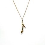 Ordsall 9ct Gold Shoe Necklace CMP00296: A refined 9ct gold pendant and chain delicately crafted in the shape of a high heel. Lightweight and versatile, perfect for everyday elegance.