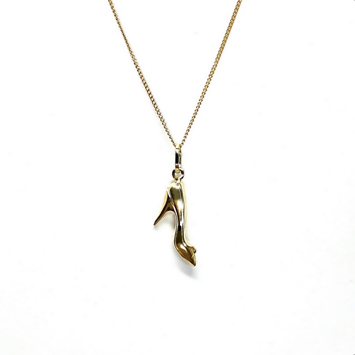 Ordsall 9ct Gold Shoe Necklace CMP00296: A refined 9ct gold pendant and chain delicately crafted in the shape of a high heel. Lightweight and versatile, perfect for everyday elegance.