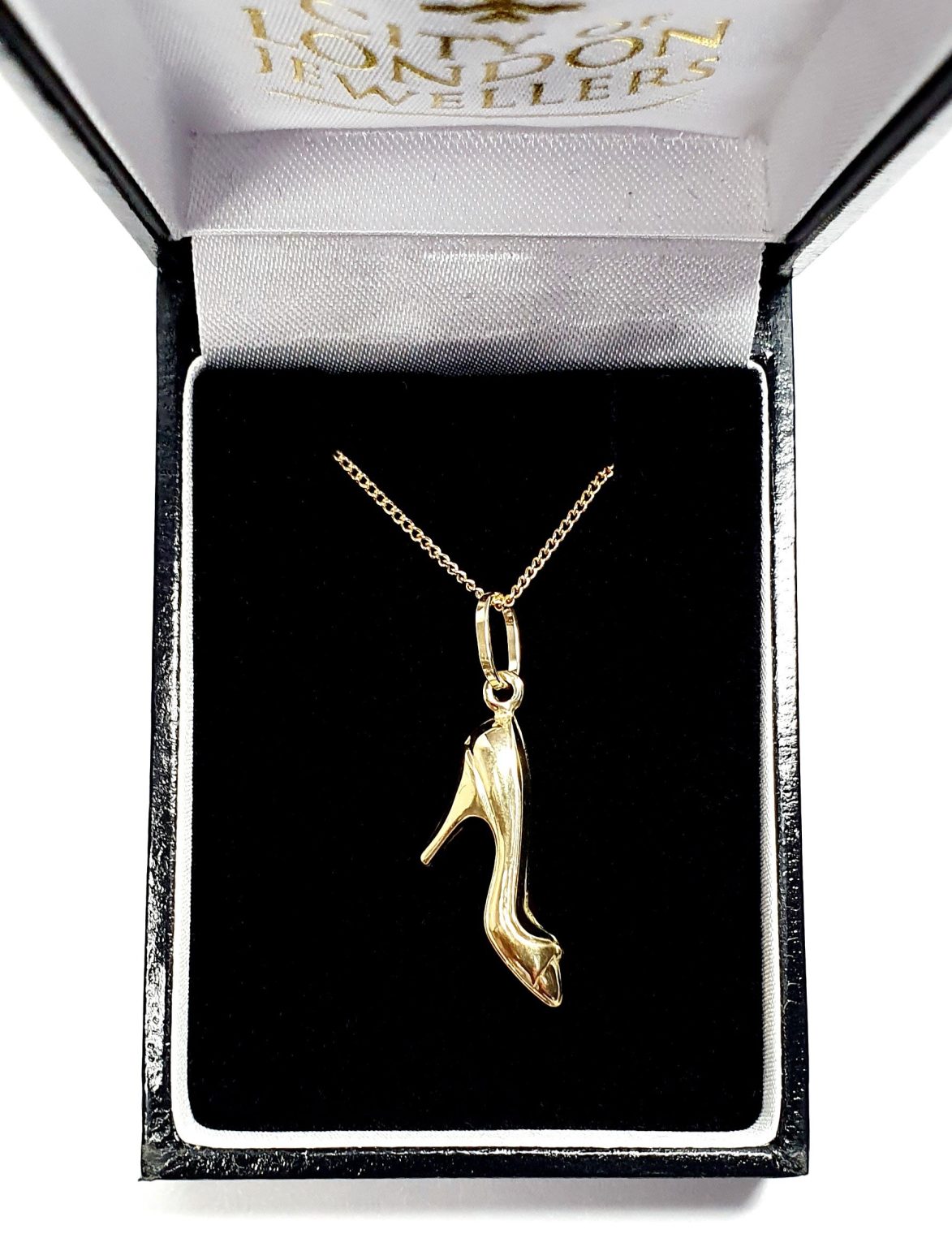 Ordsall 9ct Gold Shoe Necklace CMP00296: A refined 9ct gold pendant and chain delicately crafted in the shape of a high heel. Lightweight and versatile, perfect for everyday elegance in box.