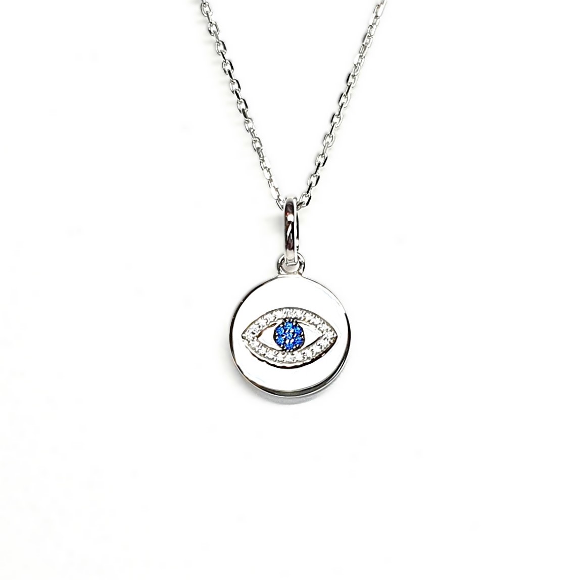 A round disc silver evil eye necklace/pendant made in real sterling silver with sparkling blue & white cubic zirconia with a highly polished finish.