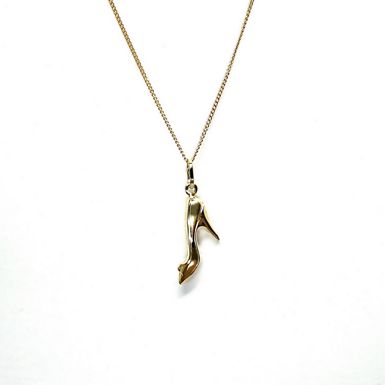 Ordsall 9ct Gold Shoe Necklace CMP00296: A refined 9ct gold pendant and chain delicately crafted in the shape of a high heel. Lightweight and versatile, perfect for everyday elegance.