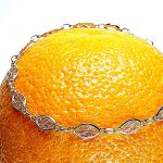 18ct yellow gold 5mm wide filigree oval bracelet 18cm/7inches long.