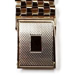 9ct yellow gold watch bracelet GWQ00018  handmade in the United Kingdom, each solid link has been carefully put together and soldered by hand with thick gold pins, and the sturdy gold clasp has a gorgeous engine-turned pattern with a plain cartouche suitable for engraving if you so wish.