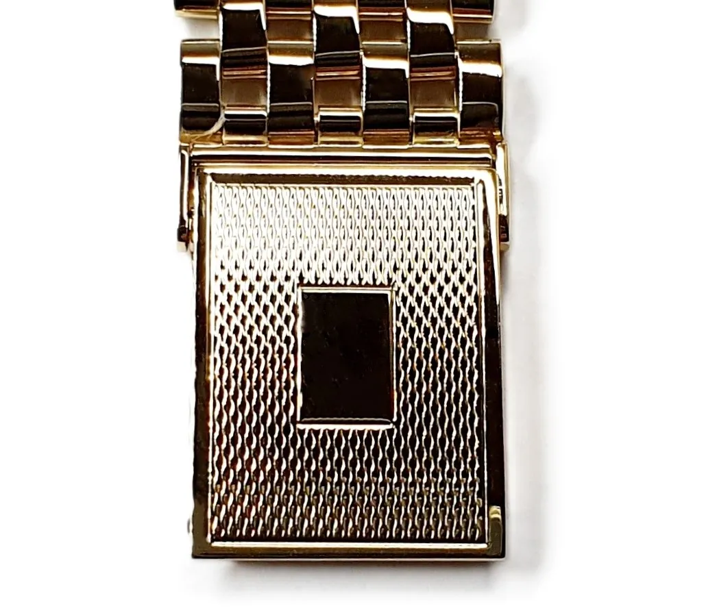 9ct yellow gold watch bracelet GWQ00018  handmade in the United Kingdom, each solid link has been carefully put together and soldered by hand with thick gold pins, and the sturdy gold clasp has a gorgeous engine-turned pattern with a plain cartouche suitable for engraving if you so wish.