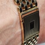 9ct yellow gold watch bracelet GWQ00018  handmade in the United Kingdom, each solid link has been carefully put together and soldered by hand with thick gold pins, and the sturdy gold clasp has a gorgeous engine-turned pattern with a plain cartouche suitable for engraving if you so wish.