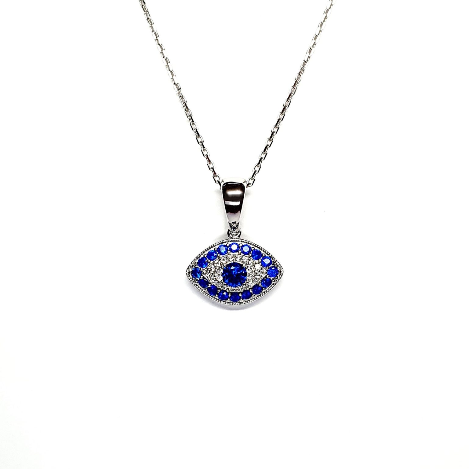 An eye-shaped silver evil eye necklace/pendant made in real sterling silver with sparkling blue & white cubic zirconia with a highly polished finish with a choice of 16, 18 or 20-inch silver chain PCS00131.