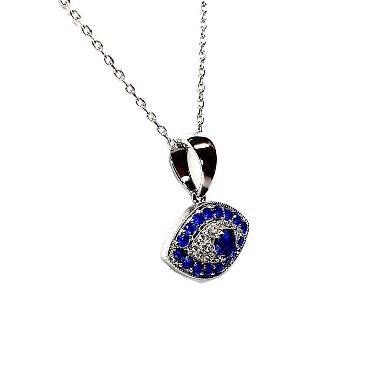 An eye-shaped silver evil eye necklace/pendant made in real sterling silver with sparkling blue & white cubic zirconia with a highly polished finish with a choice of 16, 18 or 20-inch silver chain PCS00131.