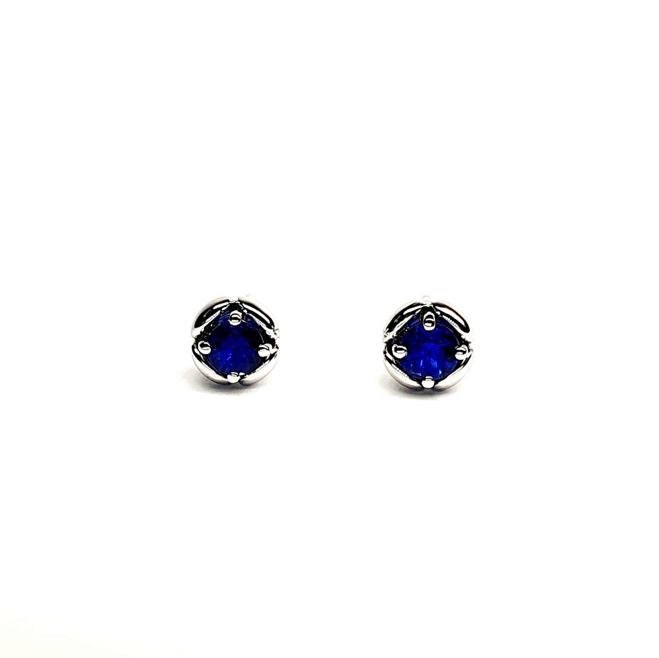 18ct white gold round royal blue sapphires in a flowering bud design stud earring ESA00506.