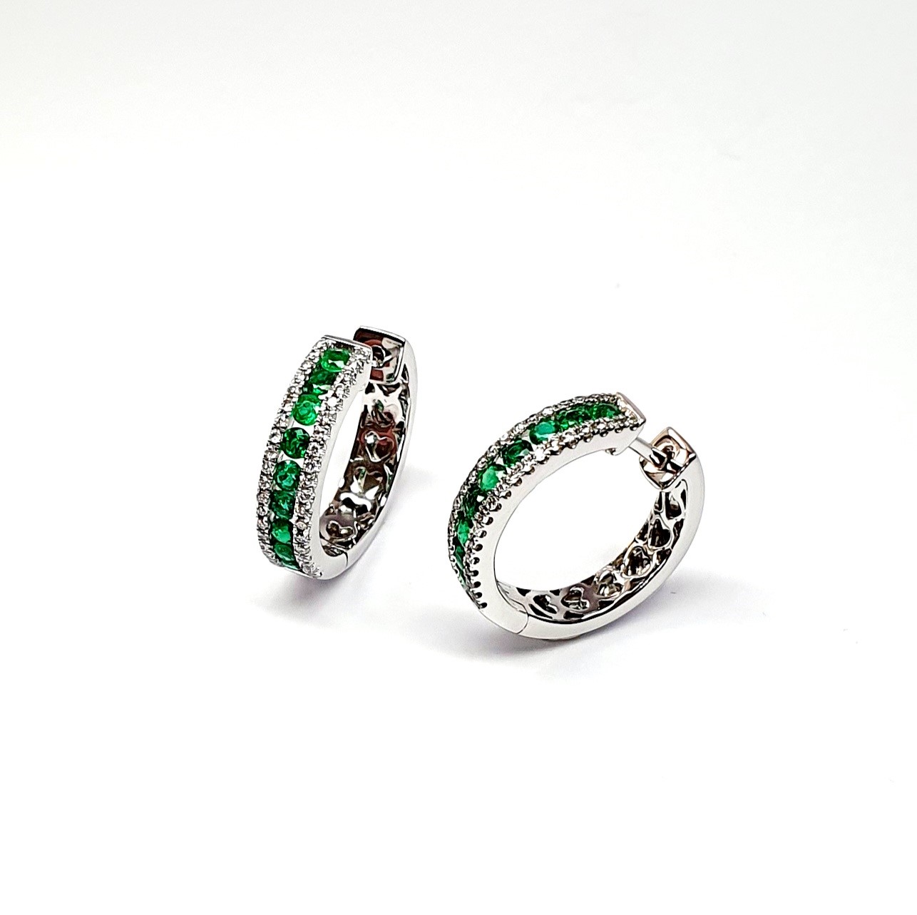 18ct White Gold Emerald & Diamond Hoop Earring facing left, highlighting the gemstones and white gold detail.