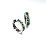 18ct White Gold Emerald & Diamond Hoop Earring facing right, showing the emeralds, diamonds and polished white gold.