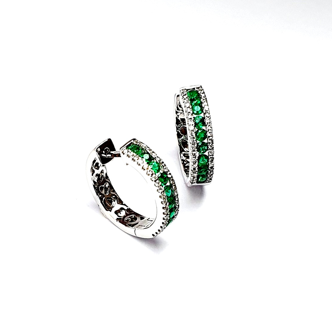18ct White Gold Emerald & Diamond Hoop Earring facing right, showing the emeralds, diamonds and polished white gold.