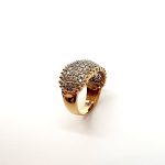 Bombay ring with Seventy round diamonds In a rhodium Pave setting, the total diamond weight is approx. one carat with 7.8 grams of 18ct yellow gold width at the top widest part is 13.6mm tapering to 3.6mm at the back