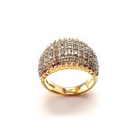 Bombay ring with Seventy round diamonds In a rhodium Pave setting, the total diamond weight is approx. one carat with 7.8 grams of 18ct yellow gold width at the top widest part is 13.6mm tapering to 3.6mm at the back
