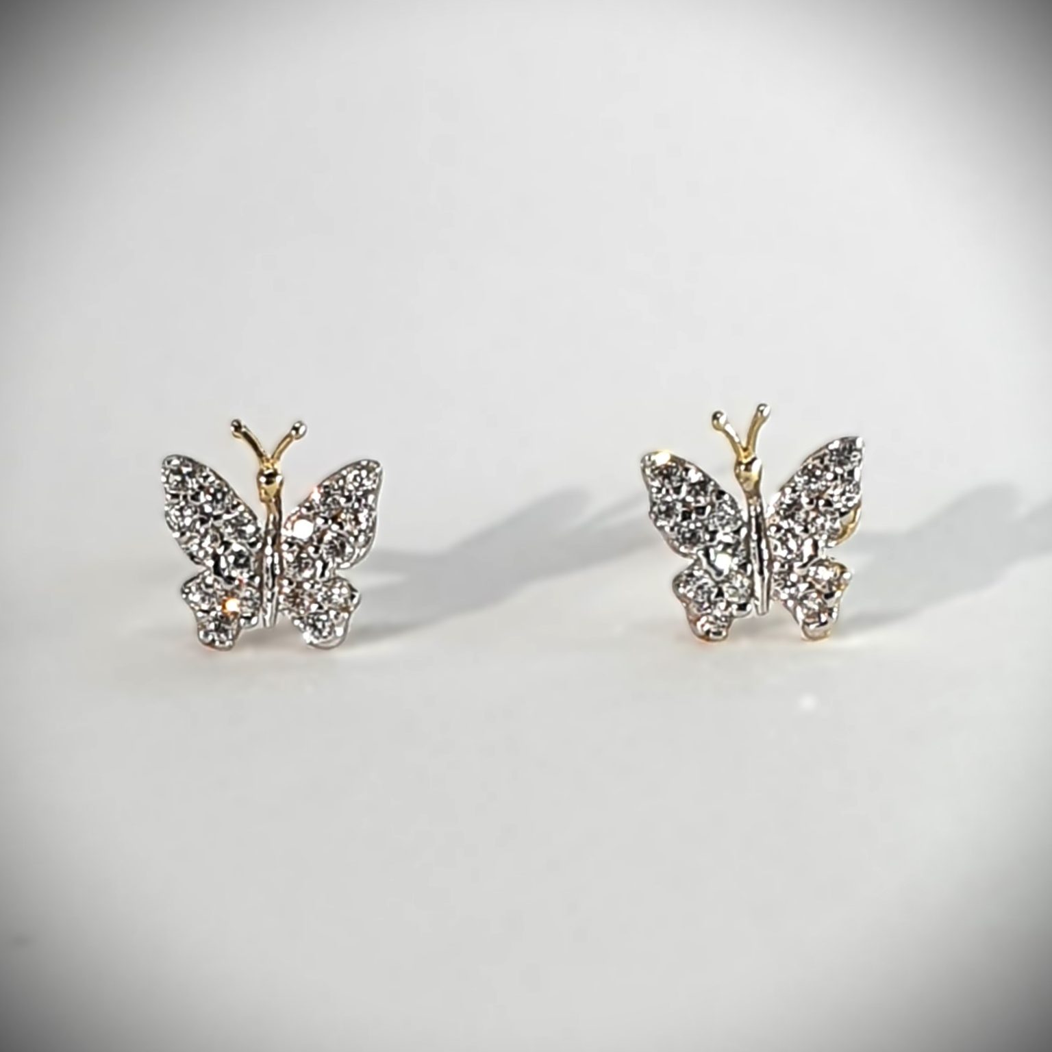 The City of London Jewellers presents the Coleford 9ct gold Cubic Zirconia butterfly stud earrings ES00791.
