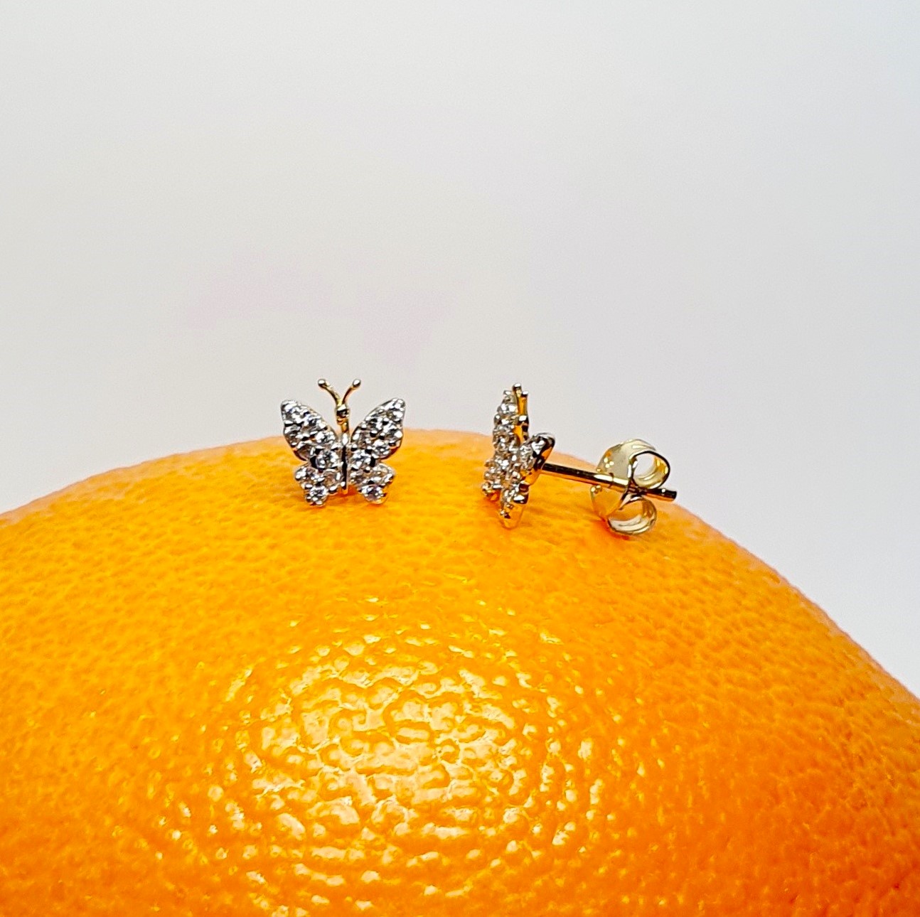 The City of London Jewellers presents the Coleford 9ct gold Cubic Zirconia butterfly stud earrings ES00791.