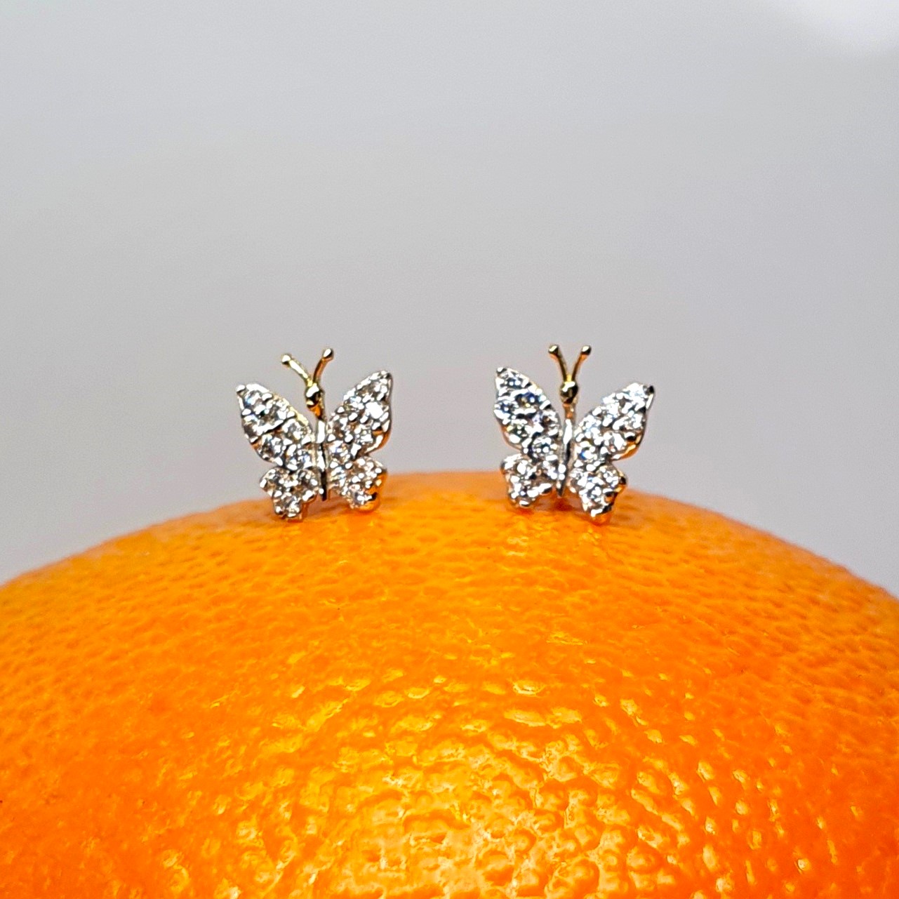 The City of London Jewellers presents the Coleford 9ct gold Cubic Zirconia butterfly stud earrings ES00791.