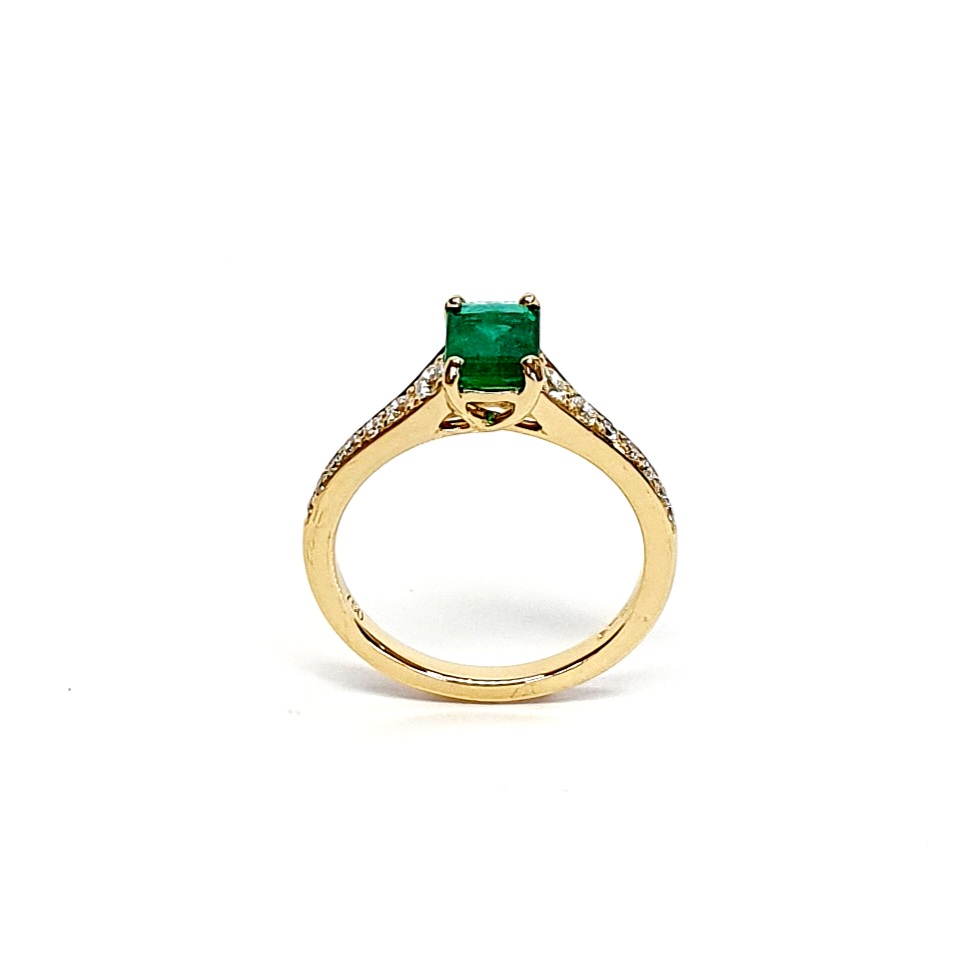 18ct Yellow Gold Emerald Cut Emerald Ring RA00694 with Diamond Tapered Shank to Each Side.