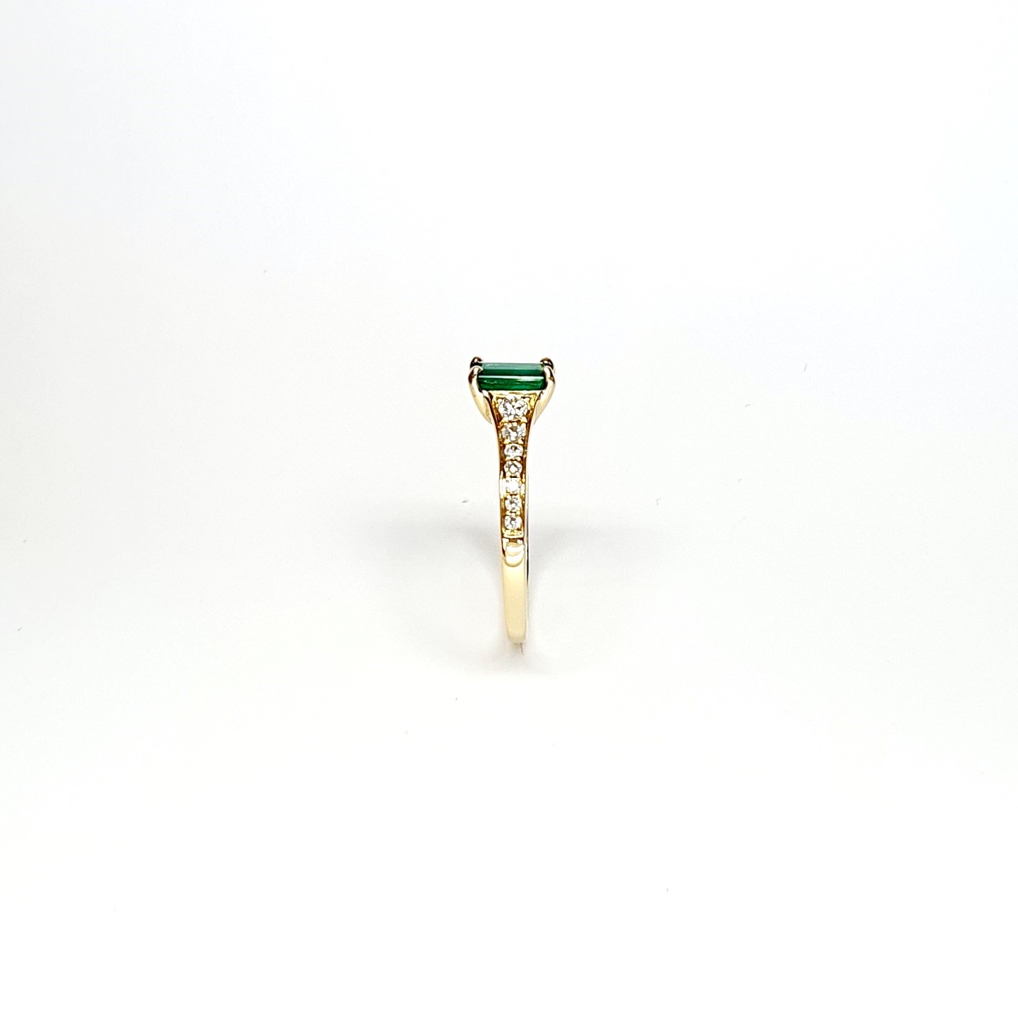 18ct Yellow Gold Emerald Cut Emerald Ring RA00694 with Diamond Tapered Shank to Each Side.