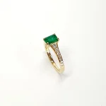 18ct Yellow Gold Emerald Cut Emerald Ring RA00694 with Diamond Tapered Shank to Each Side.