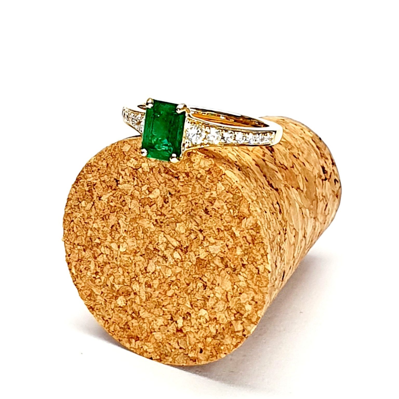 Side profile of ring against natural cork background