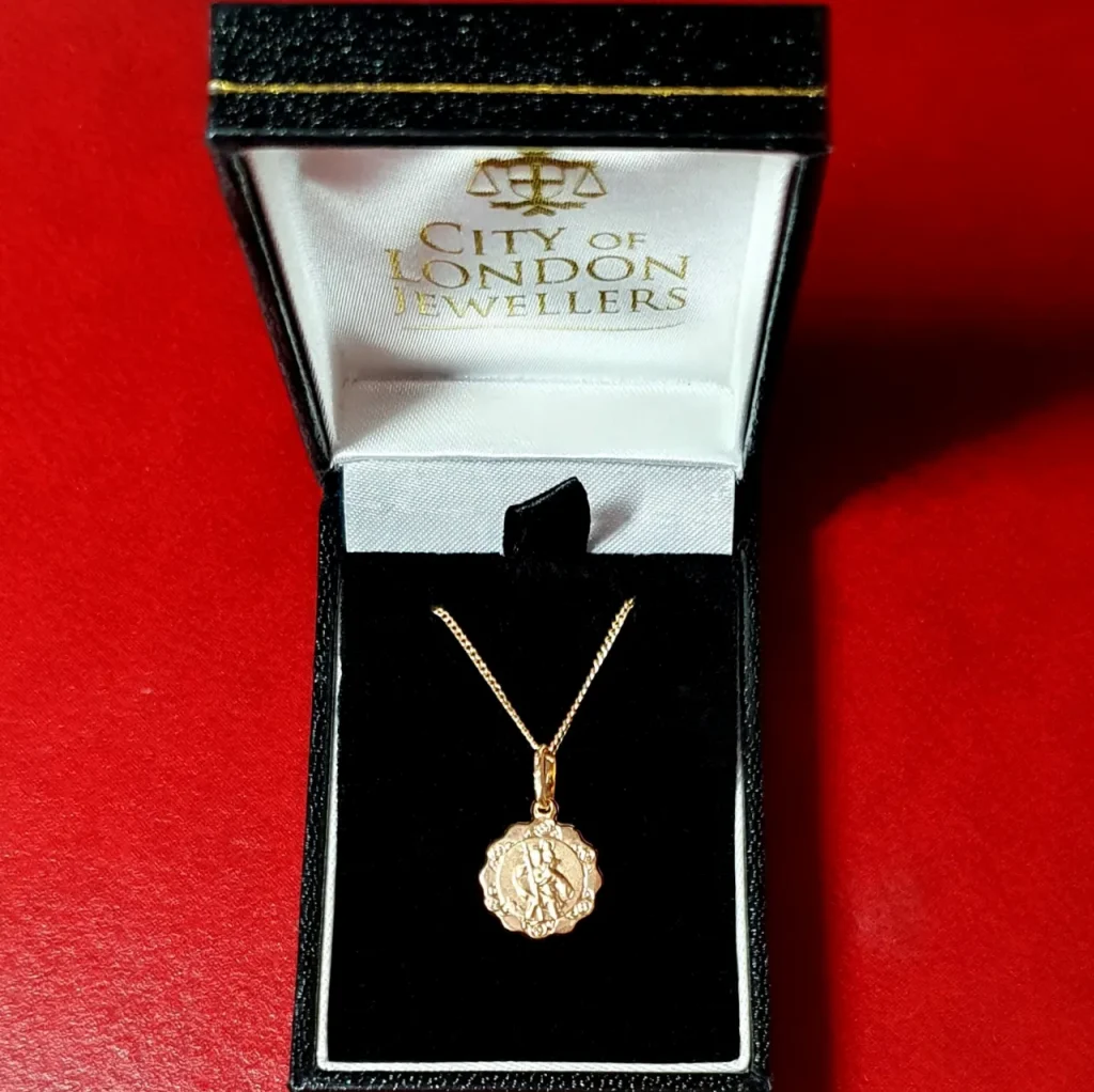 9ct-Gold Fancy-Saint-Christopher Necklace with a choice of chain lengths. In box.