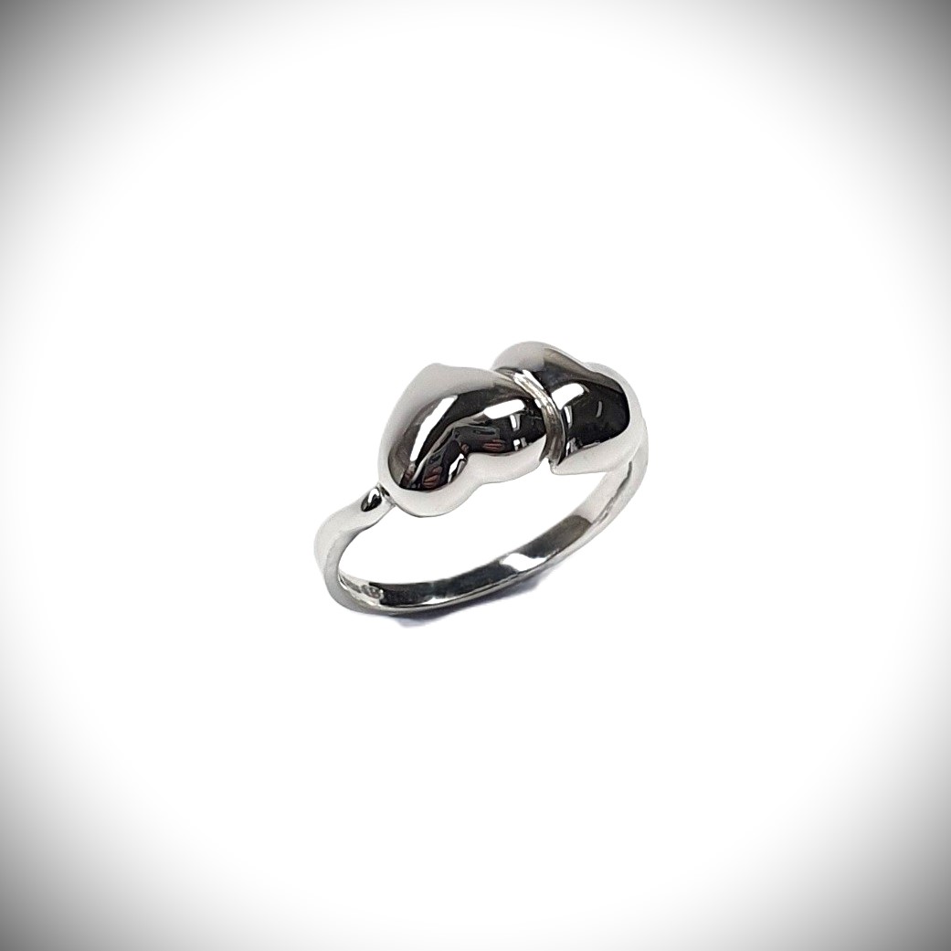 The Verona Intertwined Opposite Double Heart Ring is crafted in London from 9ct white gold with a highly polished finish R00151.