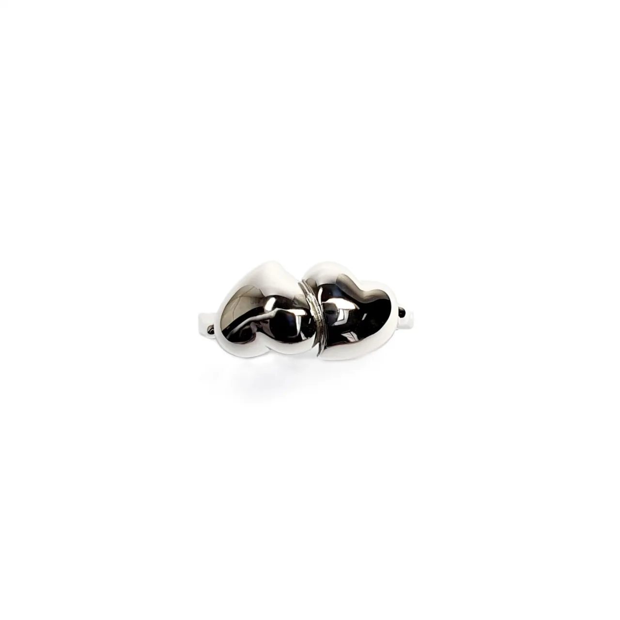 The Verona Intertwined Opposite Double Heart Ring is crafted in London from 9ct white gold with a highly polished finish R00151.
