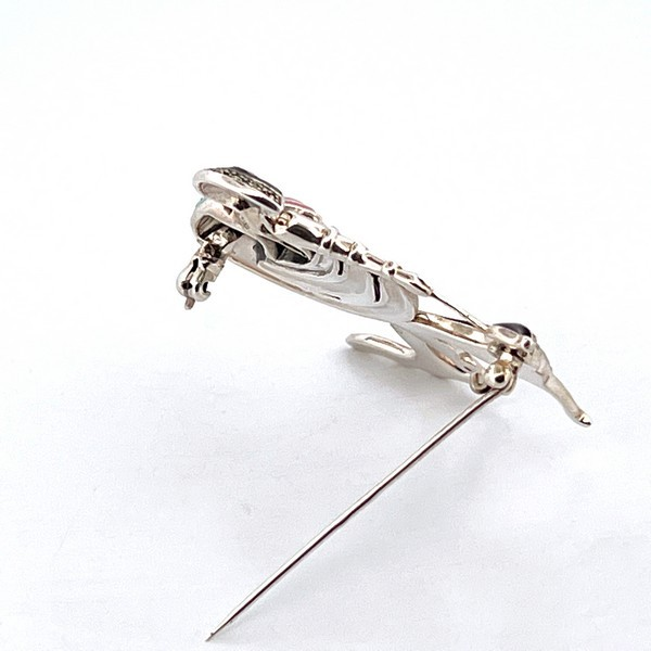 The City of London Jewellers presents the Ru Paul's Drag Race Lady & Dog Brooch Art Deco style designed in sterling silver with pink sky blue & black enamel encrusted with marcasite stones BRS00100.showing back pin.