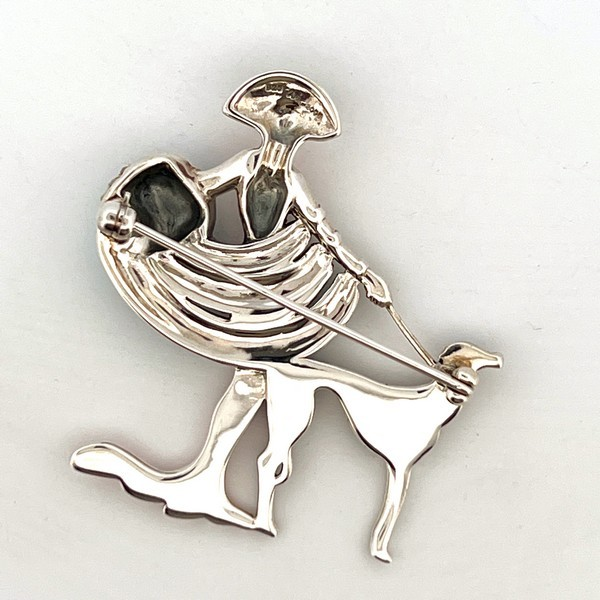 The City of London Jewellers presents the Ru Paul's Drag Race Lady & Dog Brooch Art Deco style designed in sterling silver with pink sky blue & black enamel encrusted with marcasite stones BRS00100.Showing back.