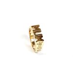 The solid 9ct yellow gold mum ring R00145 has three hand-engraved roses on each side.