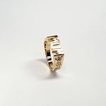 The solid 9ct yellow gold mum ring R00145 has three hand-engraved roses on each side.