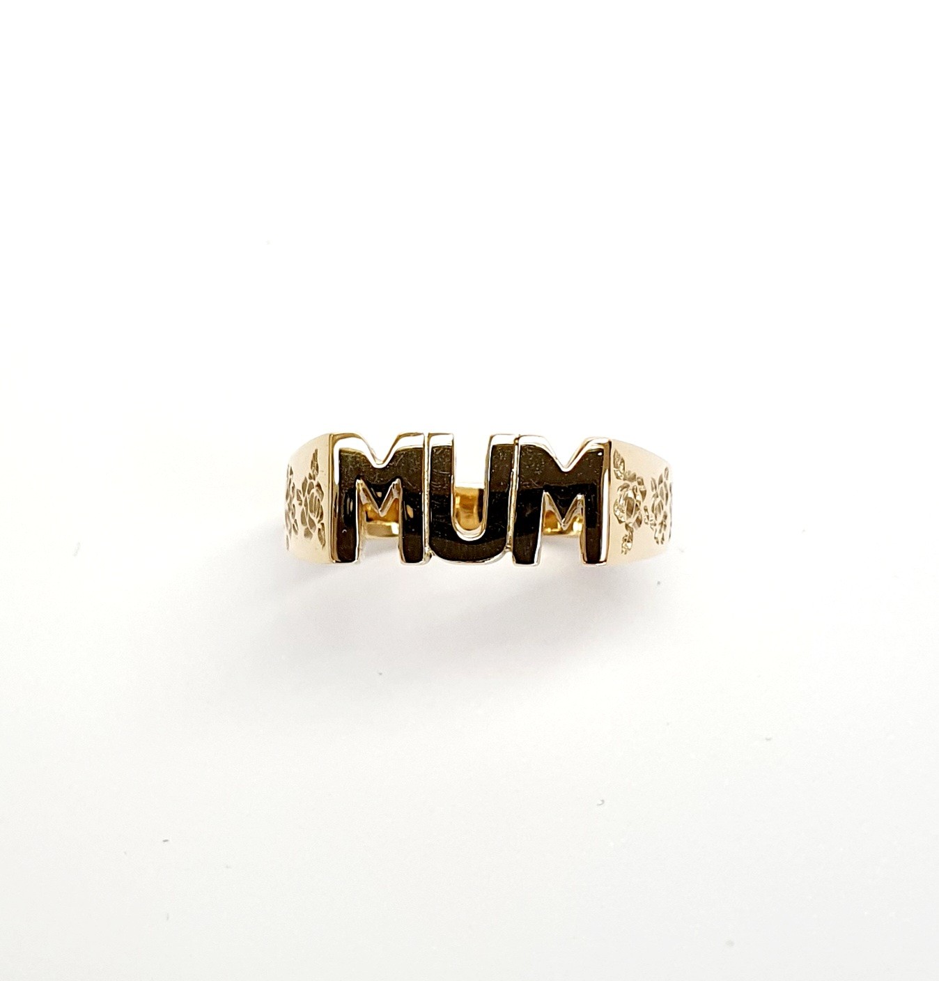 The solid 9ct yellow gold mum ring R00145 has three hand-engraved roses on each side.