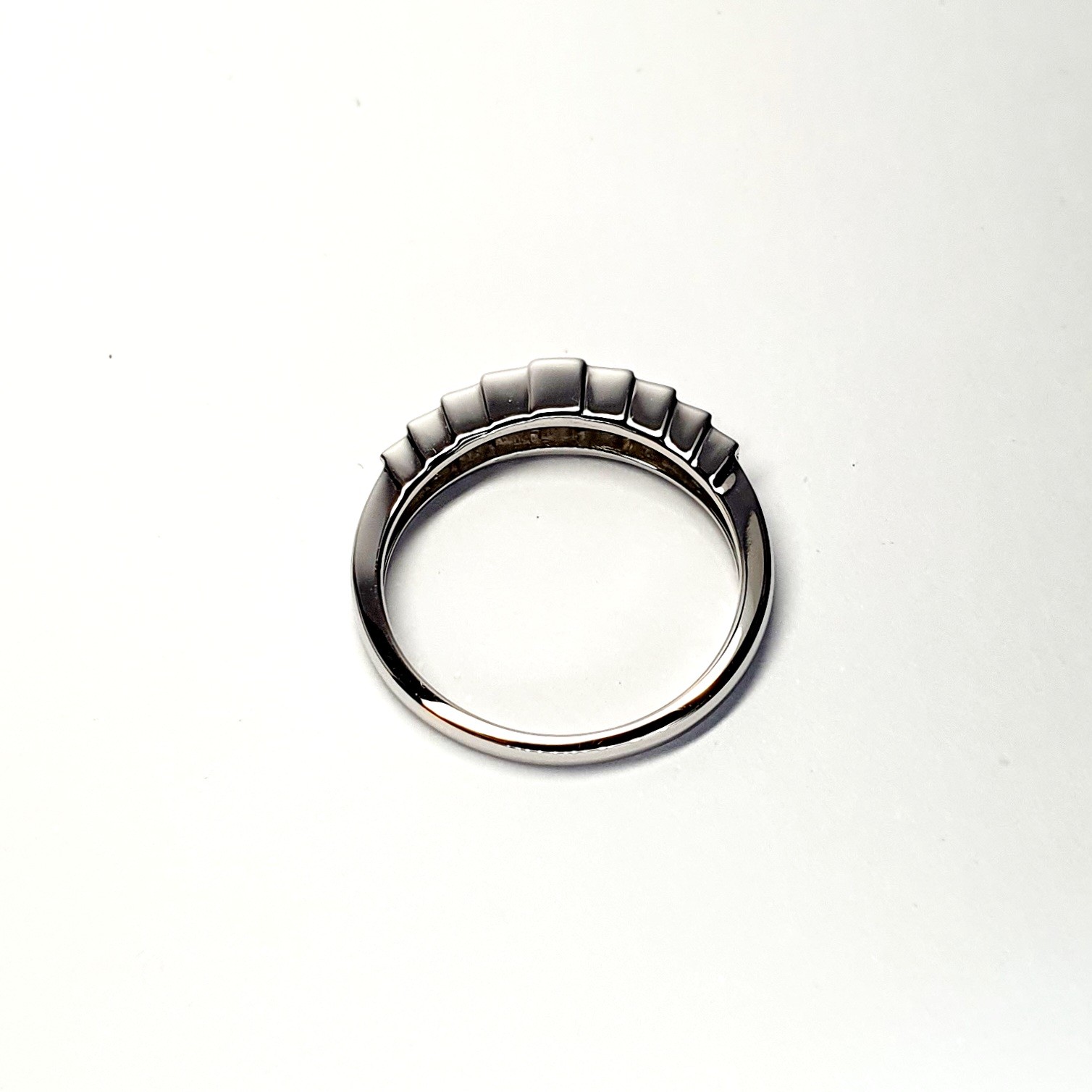 Art Deco style eternity ring crafted in 18ct white gold & set with nine graduated square princess cut diamonds in graduating square box style settings RA00697.