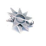 Austrian crystal and pearl star brooch, made in Britain in sterling silver, with Austrian crystals set with a single pearl in the centre, BRS00104 view of the back showing the straight pin and swivel safety catch.