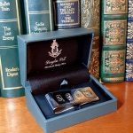 Money Clip (50mm x 18mm) has large feature hallmarks, similar to those used in a James Bond film. (Stock number MC0034) It is Picture on a red book