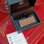 James Bond Money Clip (50mm x 18mm) has large feature hallmarks, similar to those used in a James Bond film. (Stock number MC0034) It is Picture on a red book with a hallmark description card.