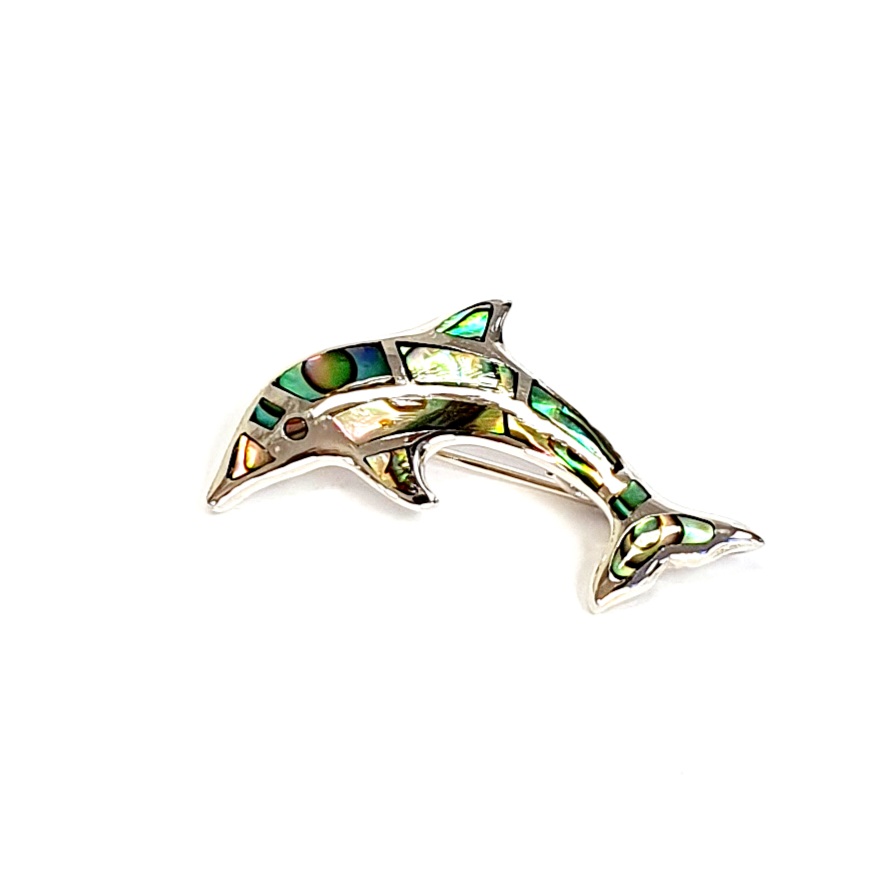 Oyster shell dolphin brooch in sterling silver. Front view close up.